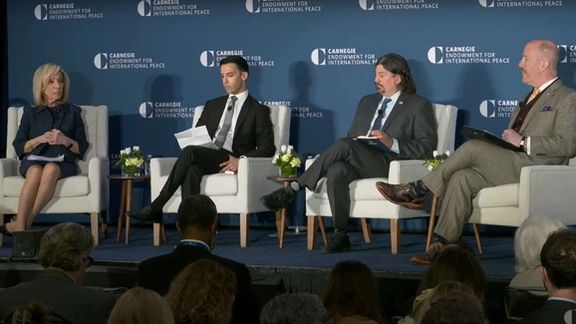 Host Andrea Mitchell with panel guests