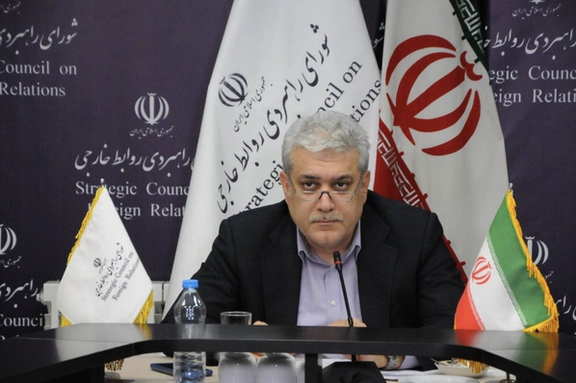 An official in Iran's Strategic Council on Foreign Relations speaks at an event hosted by the group