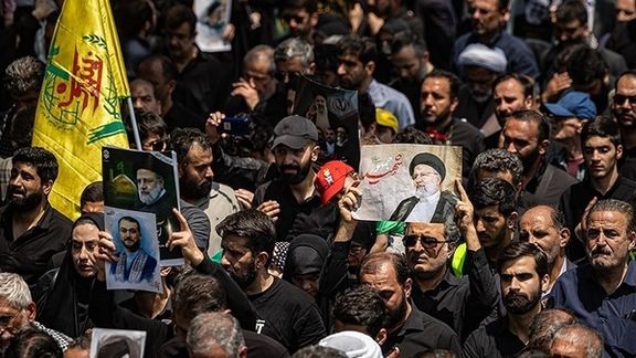 Government supporters gathered on May 22 to pay last respects to Raisi in Tehran