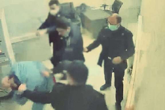 Hacked CCTV images show a prisoner being beaten in Tehran's Evin prison in 2021