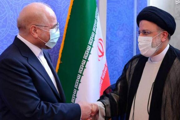 Parliament Speaker Mohammad Bagher Ghalibaf (left) and President Ebrahim Raisi
