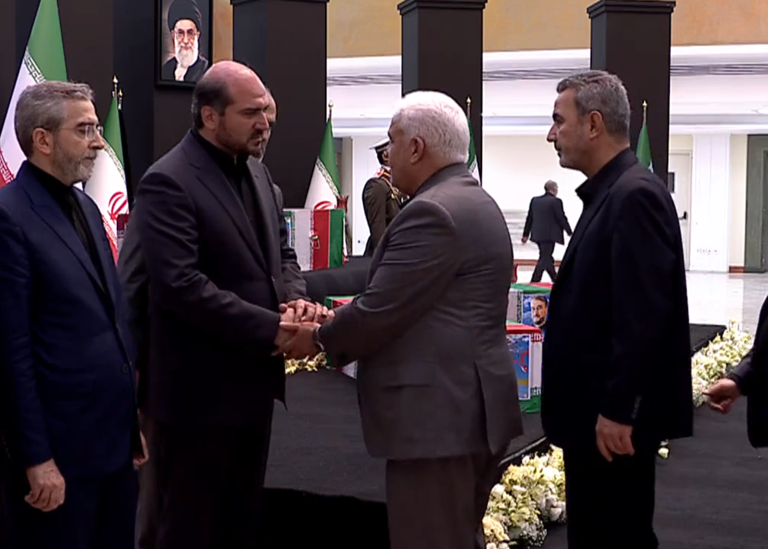 Chairman of Popular Mobilization Forces Falih Al-Fayyadh offering condolences to Deputy President for Executive Affairs Mohsen Mansouri