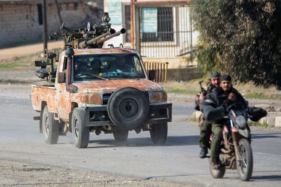 Rebels led by the Islamist militant group Hayat Tahrir al-Sham drive on a motorbike in al-Rashideen, Aleppo province, Syria November 29, 2024.