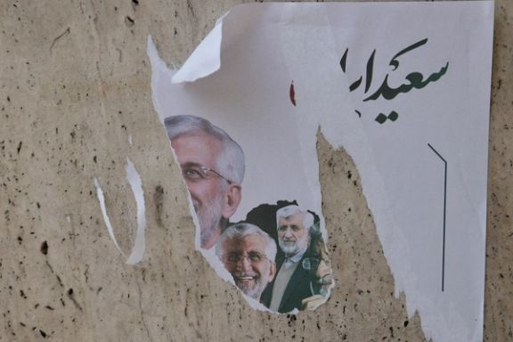 A poster of Iranian presidential candidate Saeed Jalili is seen on a street in Tehran, Iran, June 29, 2024.