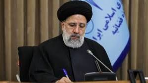 Iran's President Ebrahim Raisi taking notes during a meeting on August 1, 2022