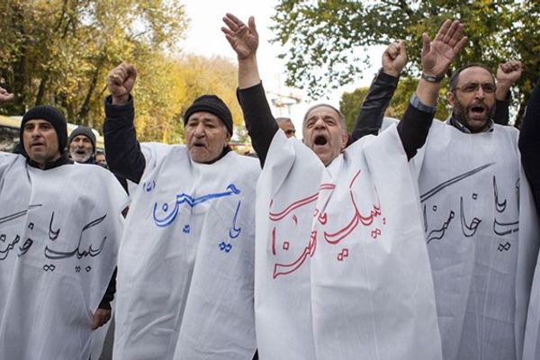 Shrouds gifted to Iran state TV guests spark outrage