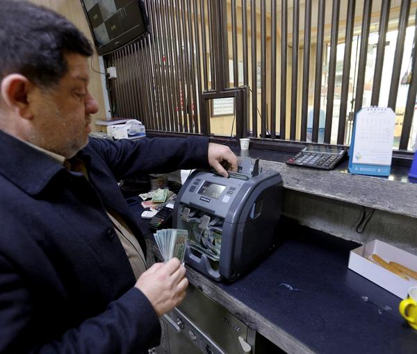 توافق بانک‌های عراق و آمریکا با وجود درخواست کنگره از بایدن برای سخت‌گیری بیشتر علیه بغداد