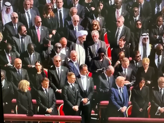 Iran’s Culture Minister Abbas Salehi and Ambassador Mohammad Hossein Mokhtari (center, in white turban) are seen standing among world leaders at the funeral of Pope Francis on April 26. 2025.