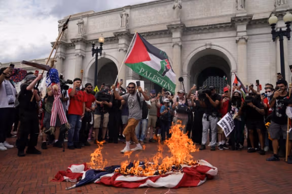 Pro-Palestinian demonstrators burn US flag, as Israeli PM Benjamin Netanyahu's speaks before Congress