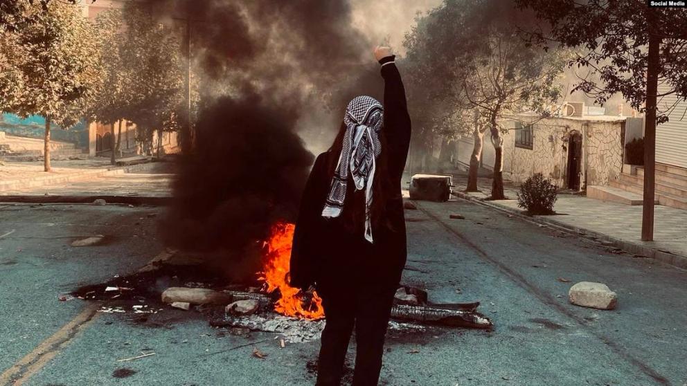 A protester in the Kurdish-majority city of Marivan in western province of Kordestan on November 6, 2022 