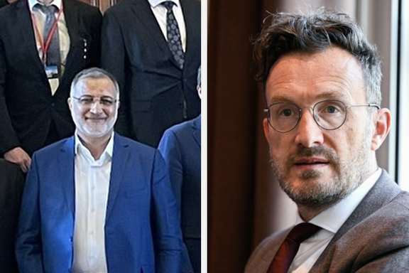 Tehran Mayor Alireza Zakani (left) and Pascal Smet, the Secretary of State for European and International Relations for the city council of the Belgian capital Brussels