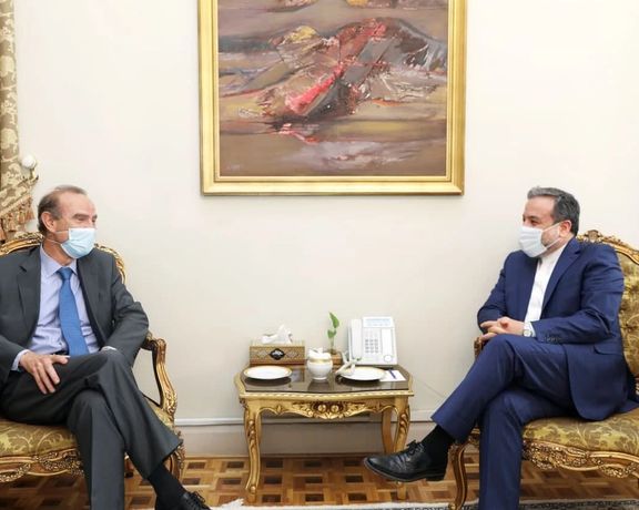 Enrique Mora with Iran's former chief nuclear negotiator Abbas Araghchi. FILE PHOTO