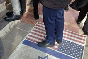 Trampled US flag removed from Iranian presidential office threshold