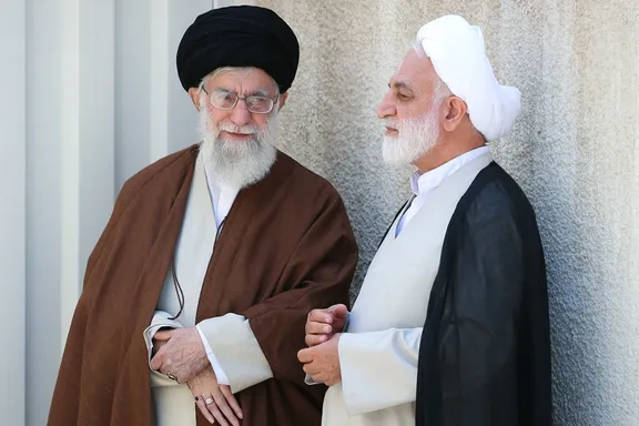 Iran's Chief Justice Gholam-Hossein Mohseni Ejei with Supreme Leader Ali Khamenei