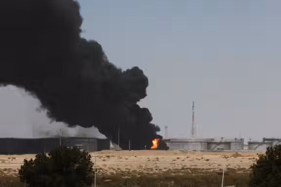 Smoke billows from a Saudi Aramco's petroleum storage facility after an attack in Jeddah, March 26, 2022.