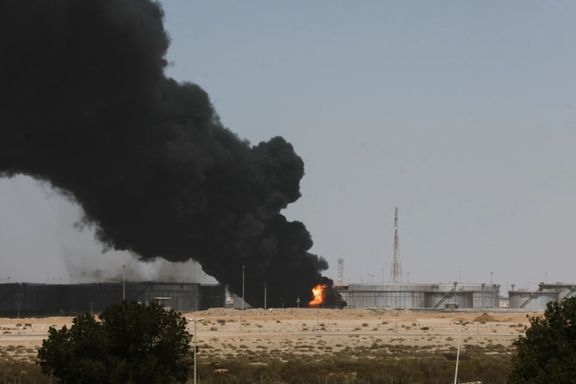 Smoke billows from a Saudi Aramco's petroleum storage facility after an attack in Jeddah, March 26, 2022.