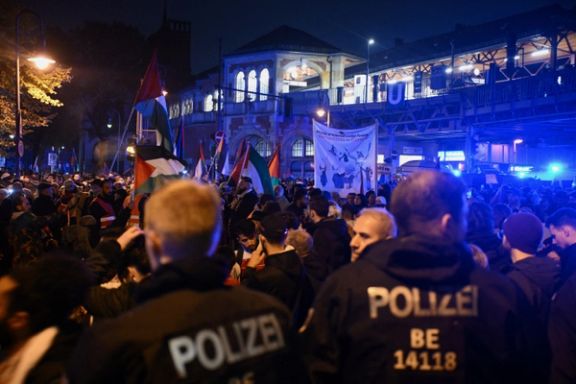 Police officers stand guard as people attend a pro-Palestinian demonstration, in Berlin, Germany October 28, 2023.