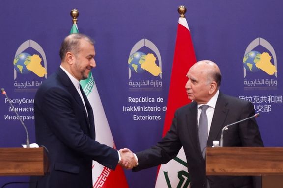 Iranian Foreign Minister Hossein Amir-Abdollahian with Iraqi Foreign Minister Fuad Hussein at a joint news conference, in Baghdad, February 22, 2023
