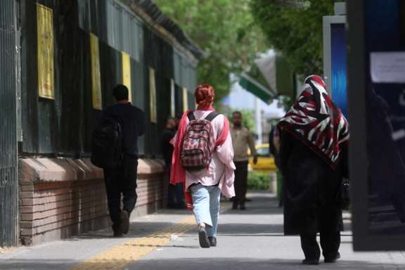 An Iranian woman without mandatory hijab in public