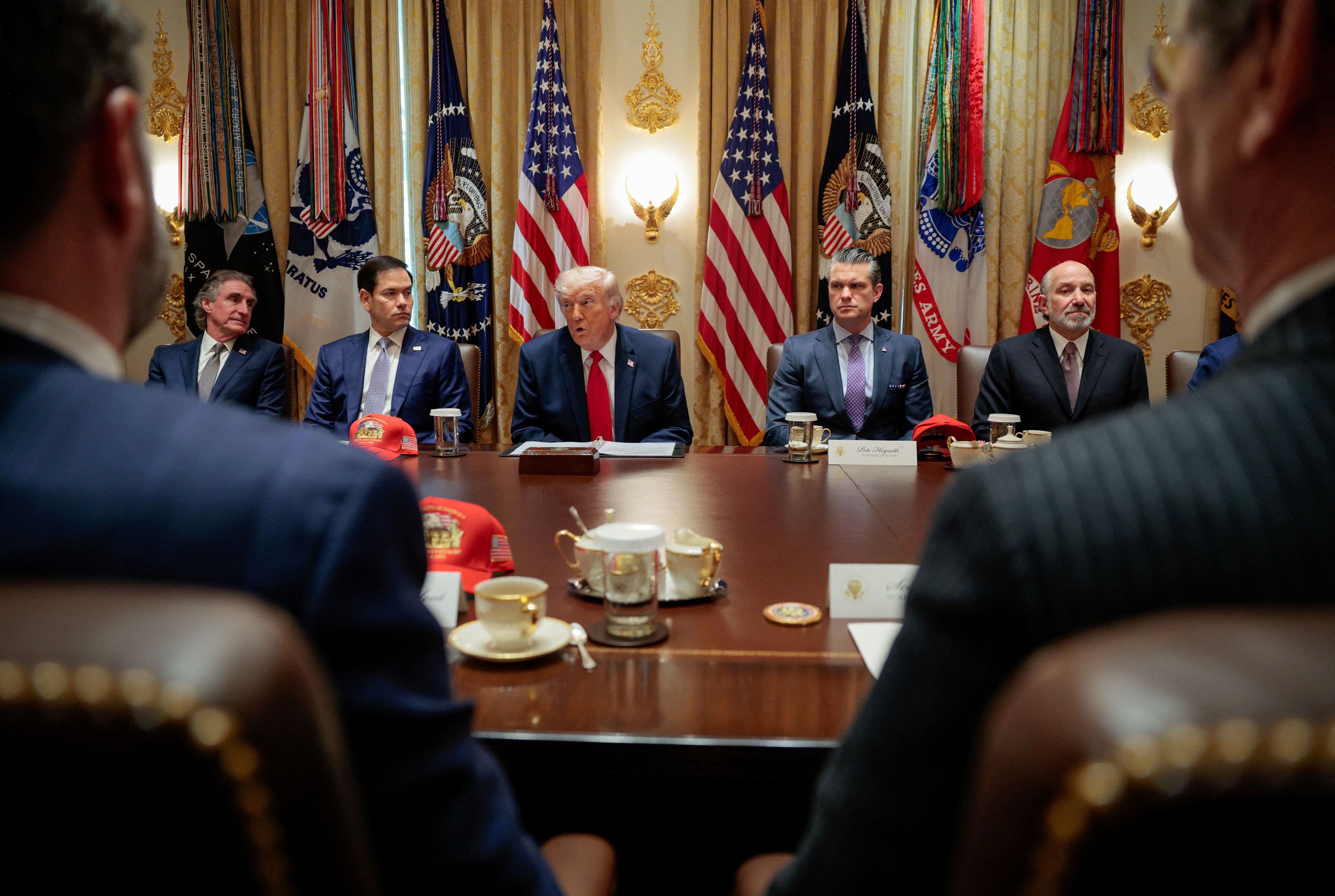 US Interior Secretary Doug Burgum, Secretary of State Marco Rubio, US President Donald Trump, Defense Secretary Pete Hegseth and Commerce Secretary Howard Lutnick attend a cabinet meeting in the Cabinet Room at the White House, in Washington, May 27, 2026. 