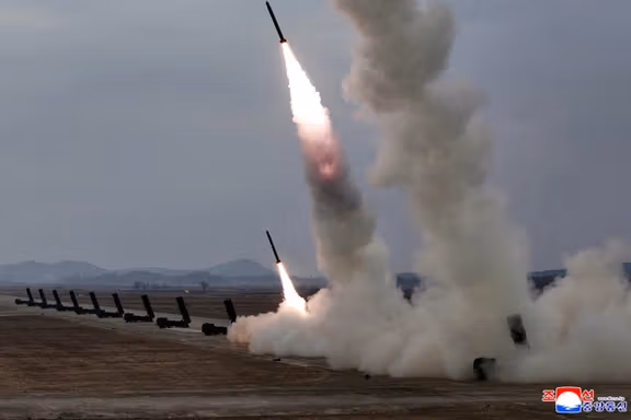 A test-launch of 600 mm-calibre multiple rocket launchers is overseen by North Korean leader Kim Jong Un (not pictured), North Korea, March 14, 2026, in this picture released by North Korea's official Korean Central News Agency.