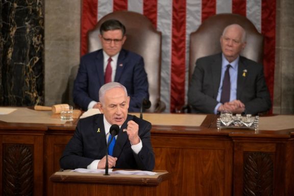 US House Speaker Mike Johnson (R-LA) and Senate Foreign Relations Chair, Senator Ben Cardin (D-MD), listen as Israeli Prime Minister Benjamin Netanyahu addresses a joint meeting of Congress at the US Capitol in Washington, July 24, 2024.