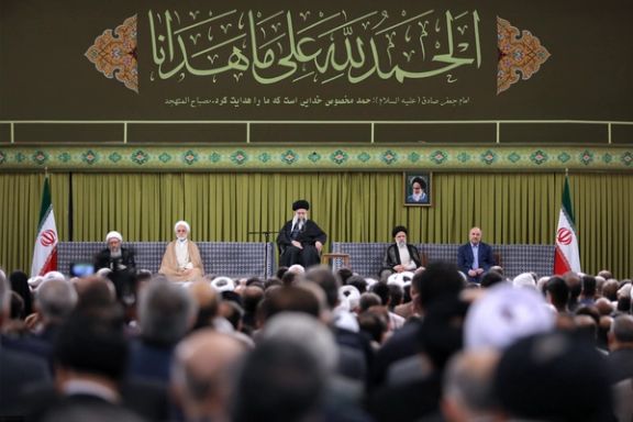 Iran Supreme Leader Ali Khamenei (center) and top government officials during a meeting with a group of envoys of Muslim countries in Tehran on April 10, 2024