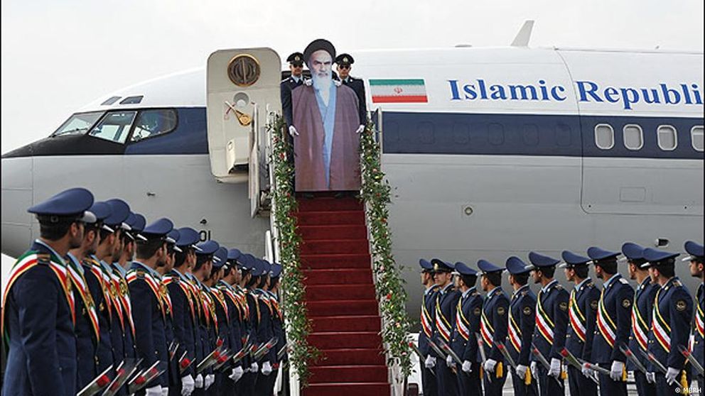 A re-enactment of Khomeini's arrival with a strange cardboard cutout. February 2012