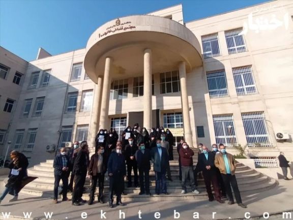 Striking staff members outside a Judiciary building in Tehran on Saturday.