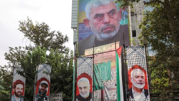 A billboard with a picture of newly appointed Hamas leader Yahya Sinwar is displayed on a building in a street in Tehran, Iran, August 12, 2024.
