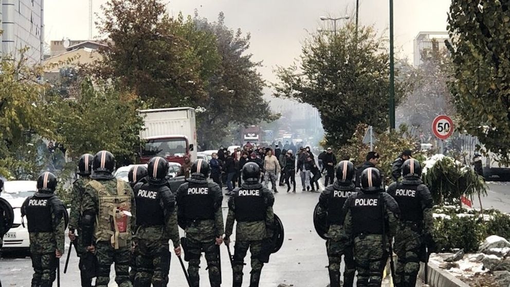 Riot police dispatched to quell protests in Tehran, on November 16, 2019