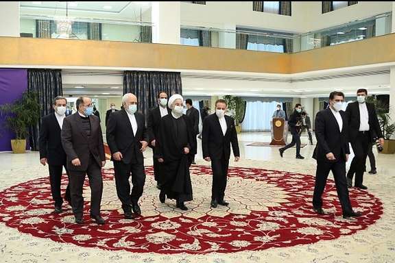President Hassan Rouhani with key ministers and aides in February 2021