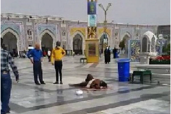 A cleric stabbed and on the ground in a Tuesday knife attack that killed one.