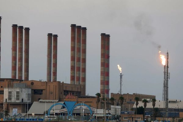 US Hits Firms Over Iran Petro-Exports, Tehran Ups Nuclear Work