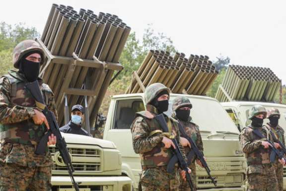Hezbollah members take part in a military exercise during a media tour organized for the occasion of Resistance and Liberation Day, in Aaramta, Lebanon May 21, 2023.