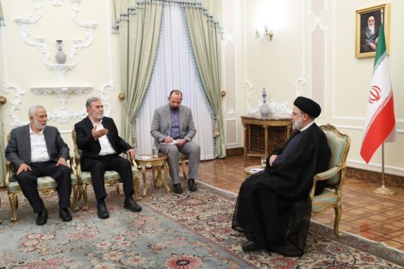 Secretary-General of the Palestinian Islamic Jihad resistance movement Ziad al-Nakhaleh (2nd from right) during a meeting with Iranian President Ebrahim Raisi in Tehran on June 18, 2023