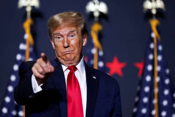 Republican presidential candidate and former US President Donald Trump gestures at a campaign event ahead of the Republican presidential primary election in North Charleston, South Carolina, February 14, 2024.