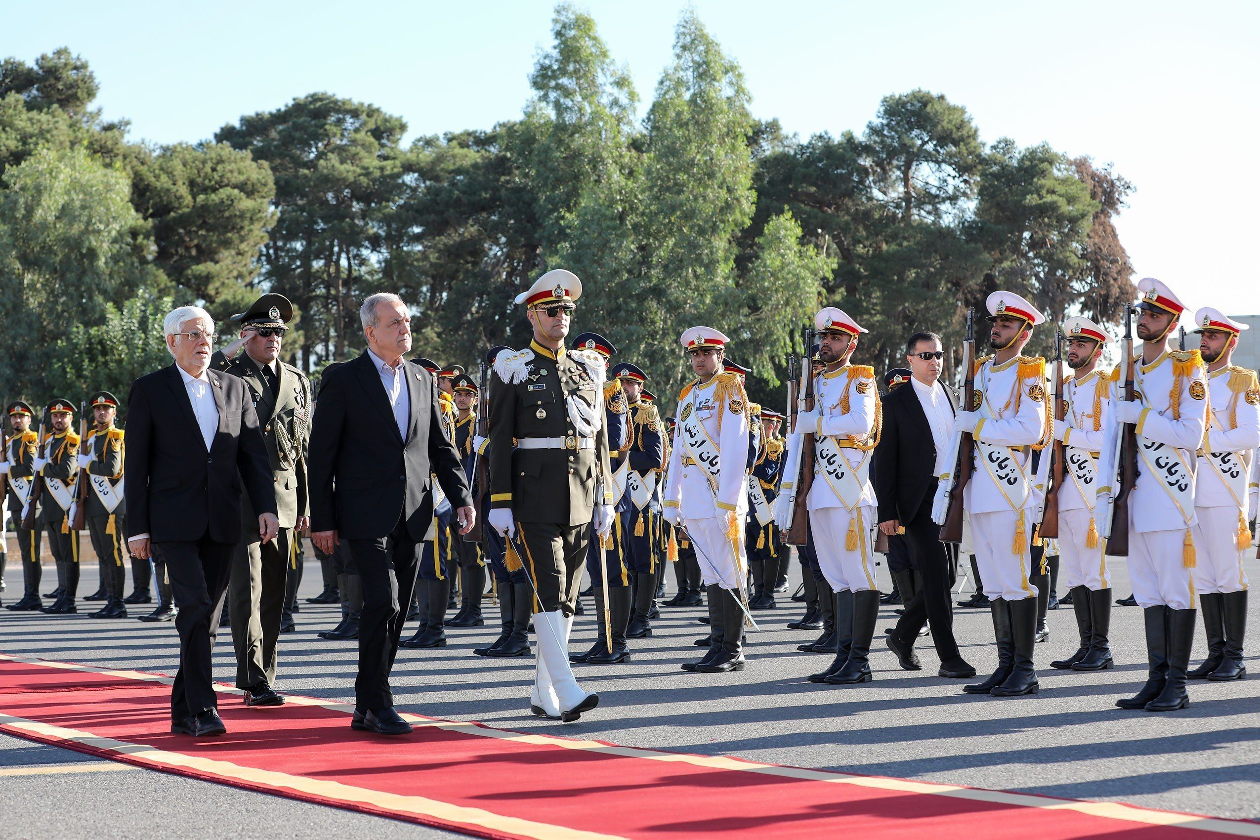 Iranian President Masoud Pezeshkian reviews an honor guard before leaving Tehran for New York to attend the United Nations General Assembly, on September 22, 2026. 