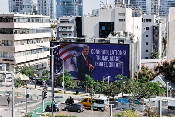 US President-elect Donald Trump appears on a congratulatory billboard for the 2024 Presidential Election, in Tel Aviv, Israel, November 6, 2024.