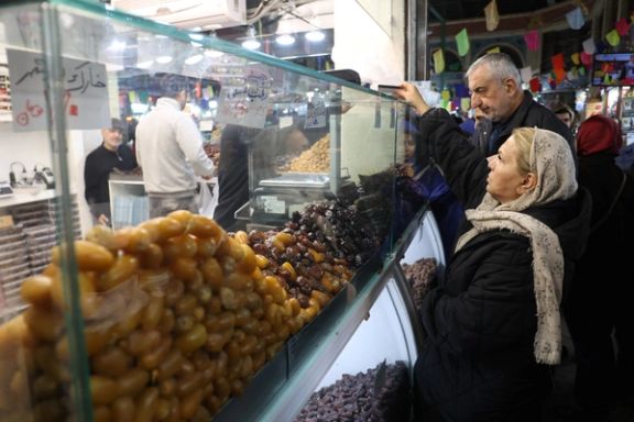 A woman shops during the fasting month of Ramadan in Tehran, Iran, March 11, 2024.