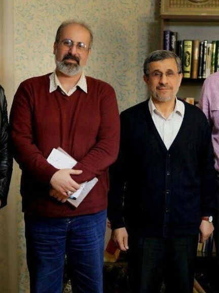 Former President Mahmoud Ahmadinejad (right) and his aide Abdolreza Davari