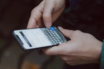 An Iranian woman fails to go online on her mobile phone in this undated file photo