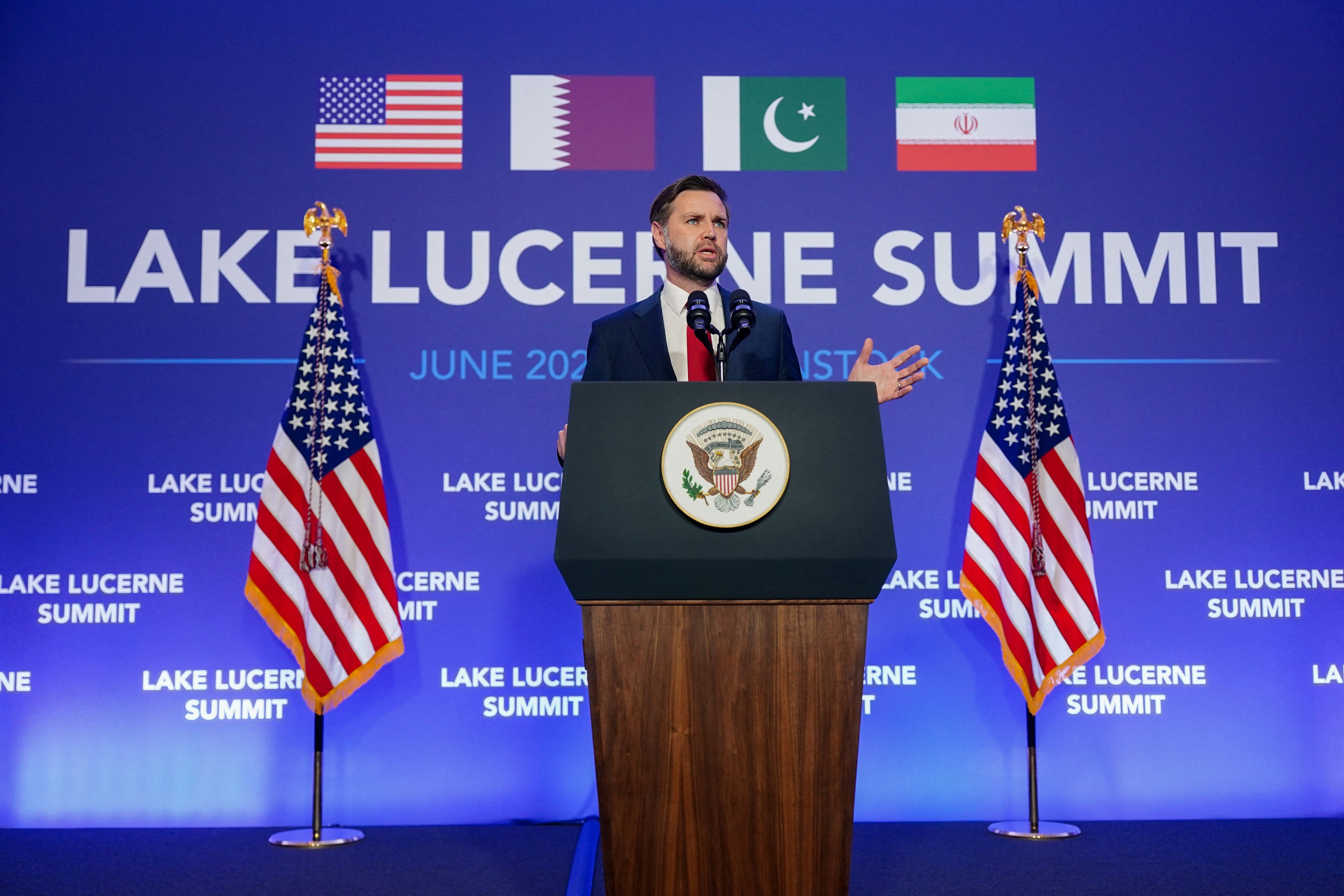 US Vice President JD Vance speaks to members of the media before boarding Air Force Two, after the US and Iran held high-level talks at the Lake Lucerne Summit, at Emmen Military Air Base, Emmen, Switzerland, June 22, 2026.