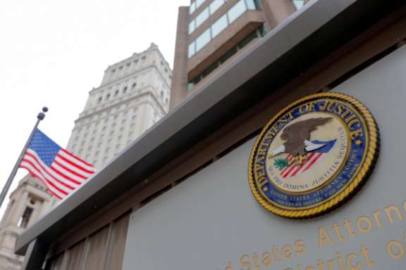 The seal of the United States Department of Justice is seen on the building exterior of the United States Attorney's Office of the Southern District of New York in Manhattan, New York City, August 17, 2020.