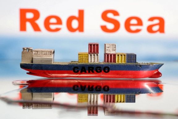 A cargo ship boat model is seen in front of the words "Red Sea" in this illustration taken January 9, 2024.
