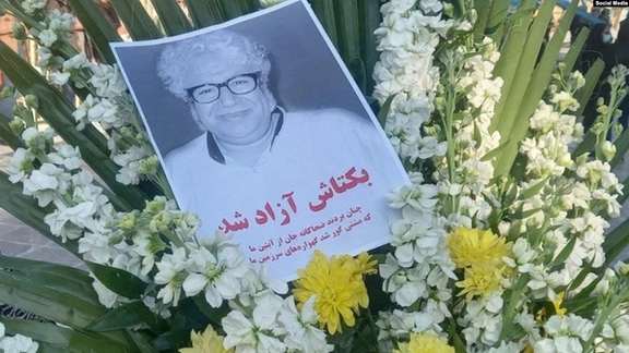 The grave of poet Baktash Abtin, a political prisoner who died in custody in January.