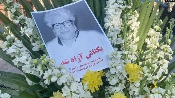 The grave of poet Baktash Abtin, a political prisoner who died in custody in January.