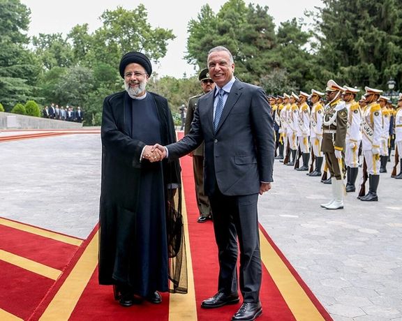Iraq's prime minister Kadhimi with Iranian president Raisi in Tehran. June 26, 2022