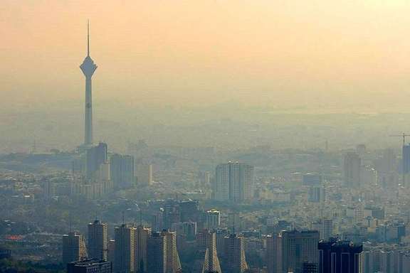 A view of Tehran and its iconic Milad tower under smog