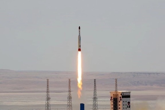 Iran's ballistic missile carrying "scientific payload" as it takes off into space.